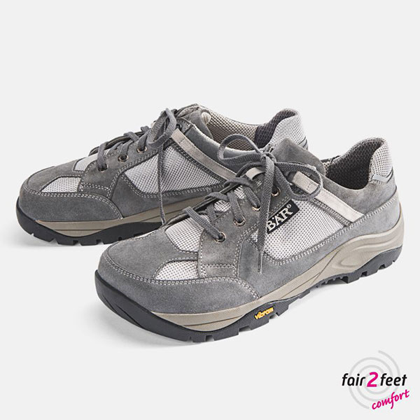 Pair of grey suede walking shoes featuring laces and sturdy soles, designed for comfort and durability.