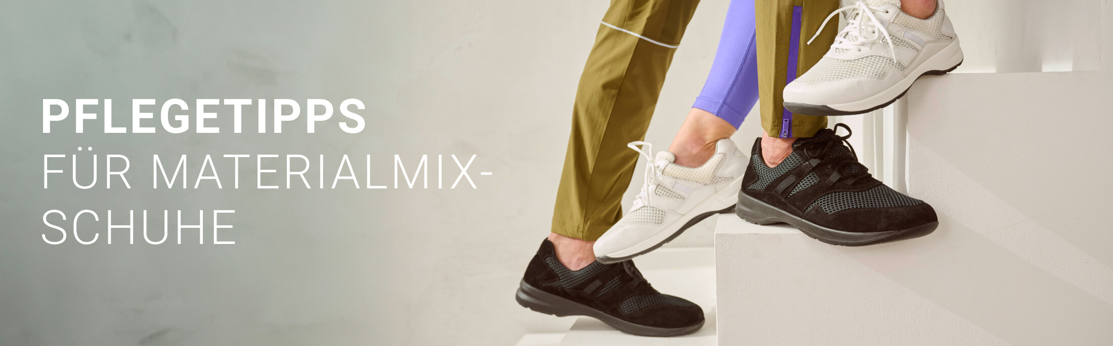 Two pairs of mixed material shoes, white and black, on steps showing shoe care tips.