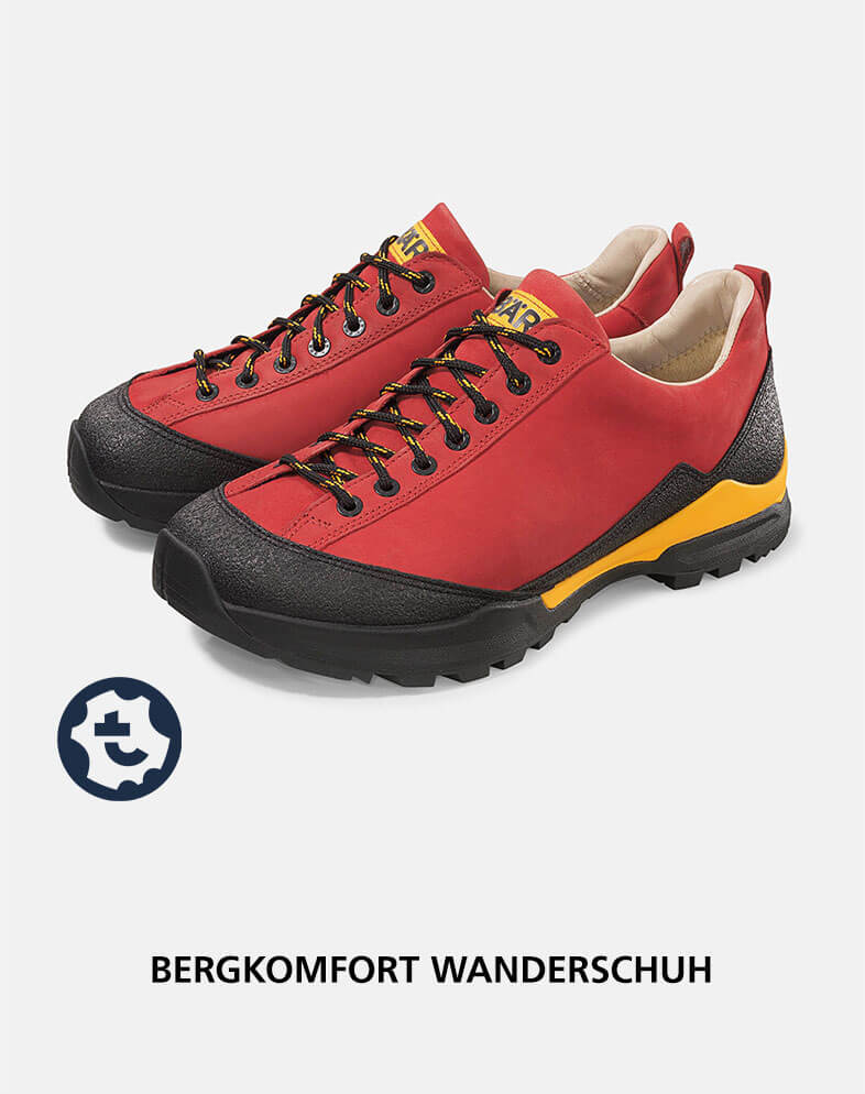 Pair of red hiking shoes featuring black and yellow accents, designed for mountain comfort