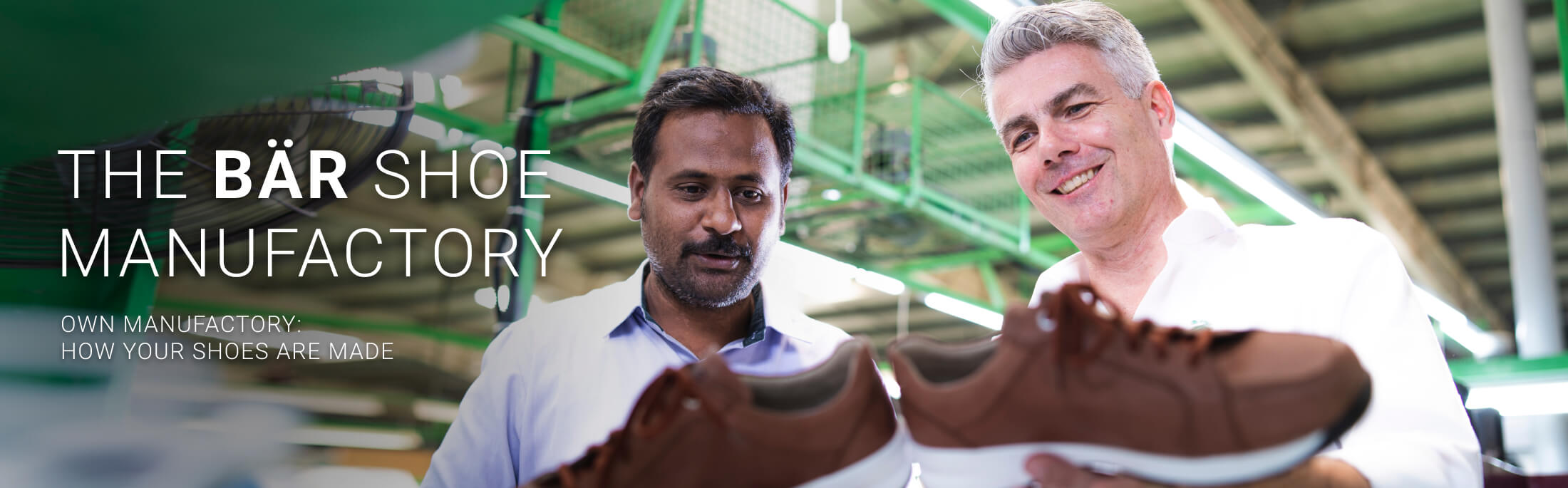 Two men examining shoes at the Bär shoe manufactory, highlighting craftsmanship.