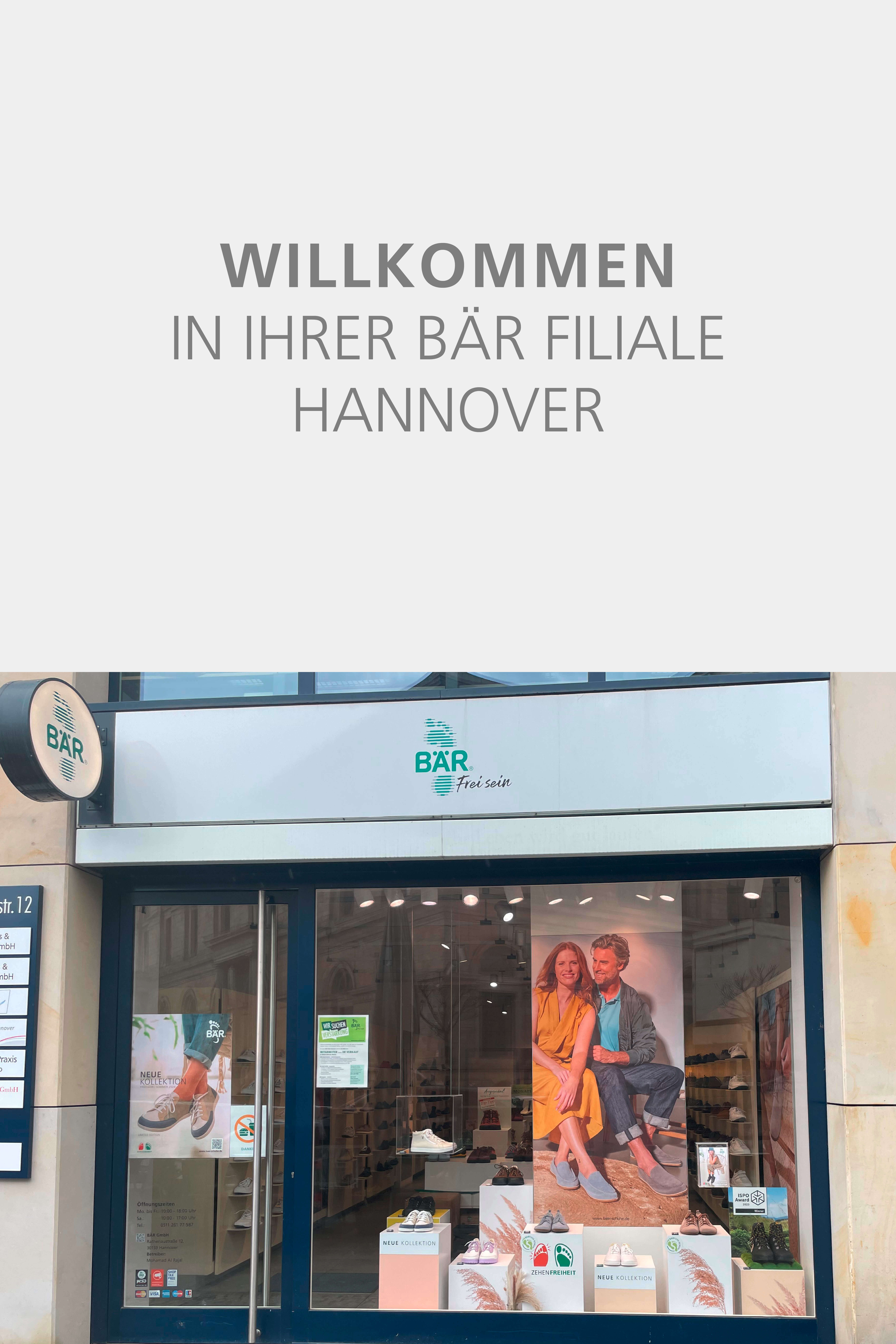 Exterior view of the BÄR store entrance in Hanover with promotional shoe displays