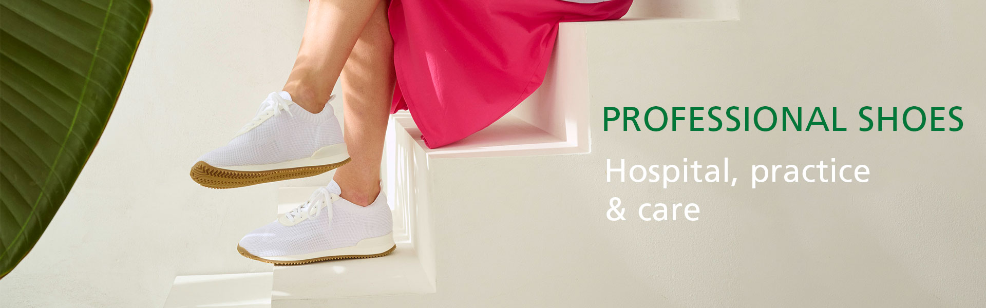 Person wearing white professional shoes while sitting on stairs, suitable for hospital, practice, and care environments