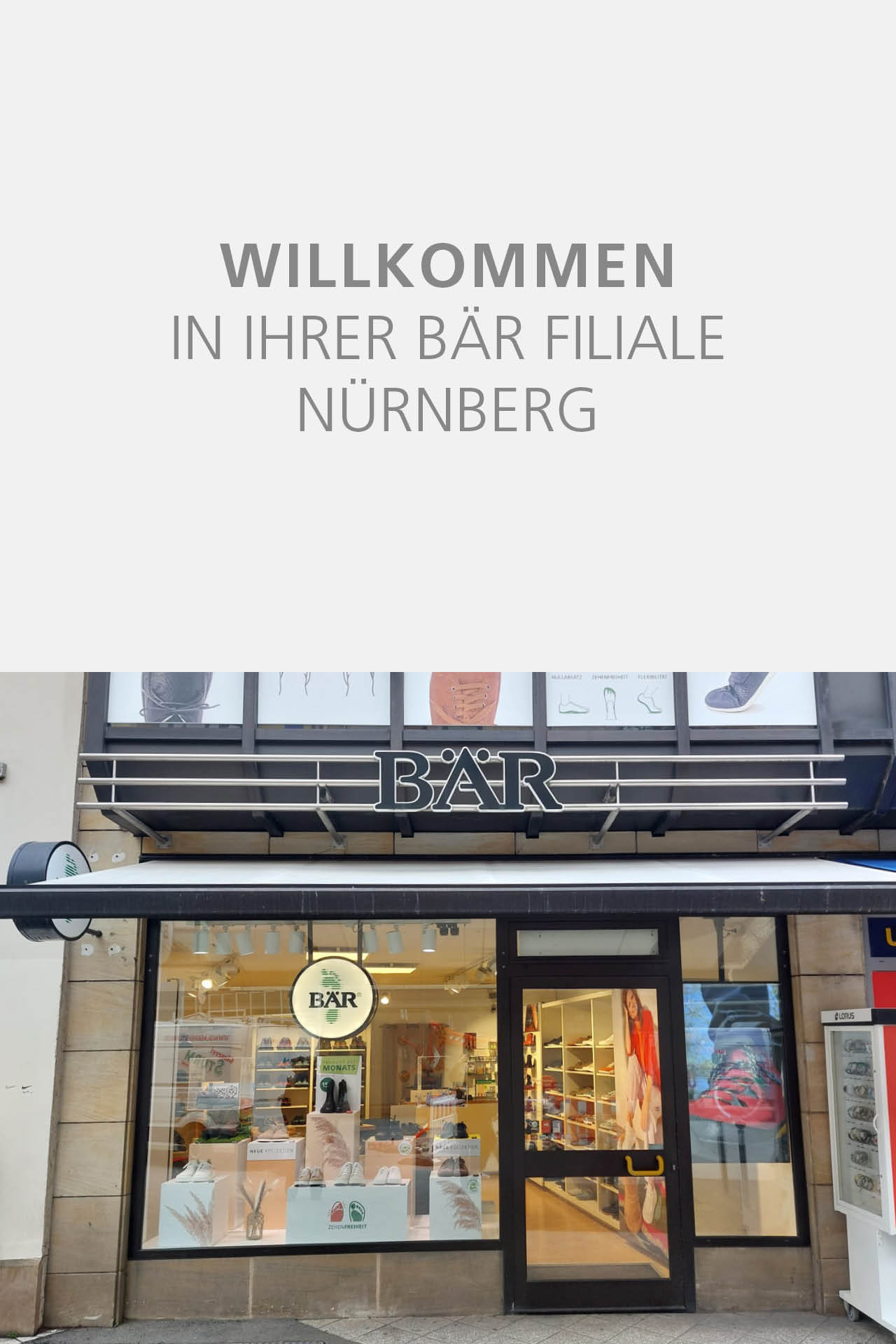 Exterior view of BÄR shoe store in Nuremberg with welcoming sign.
